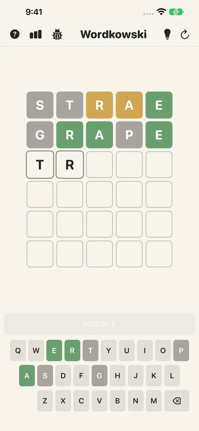 Wordkowski game board mid-play: two guesses submitted with green, amber, and gray tile feedback, a third guess in progress, and the on-screen keyboard below.